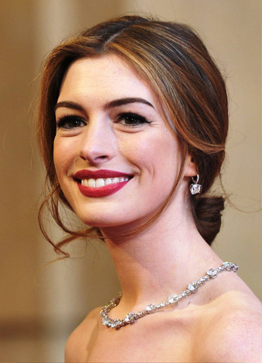 Anne Hathaway Center Part Loose Bun Updo