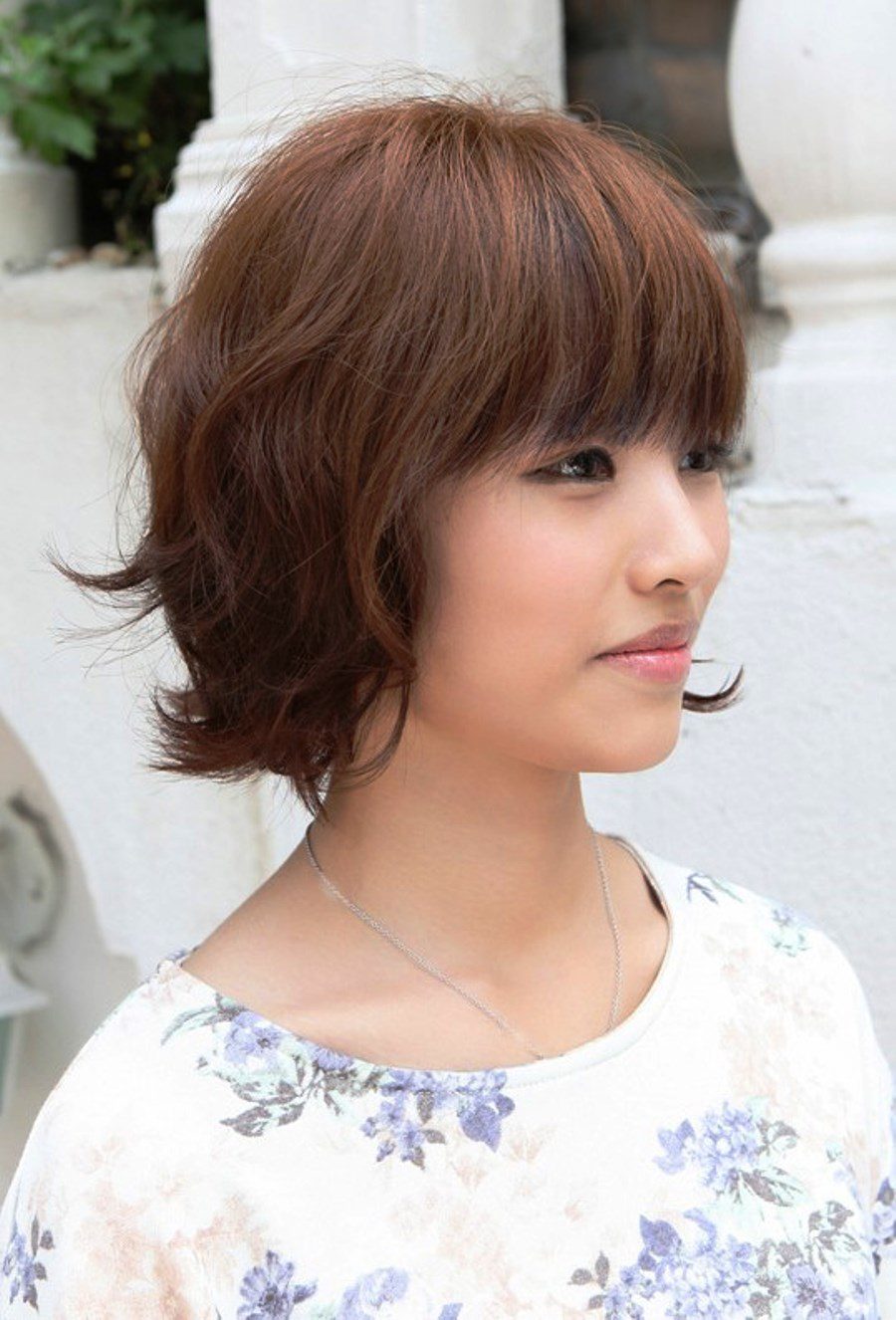 Layered Short Brown Bob Hairstyle With Bangs