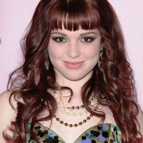 Long Red Curly Hairstyle With Blunt Bangs1
