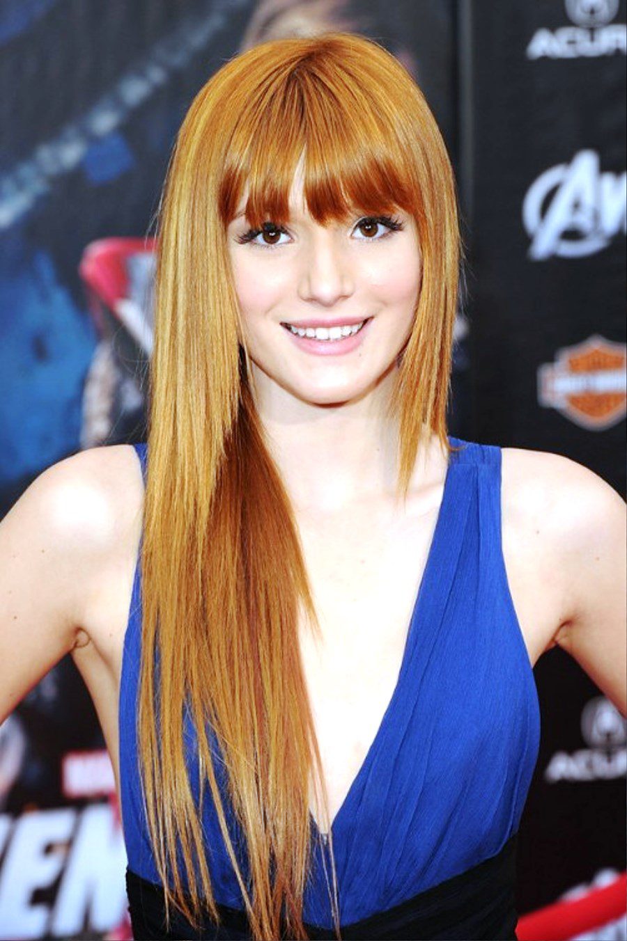 Long Sleek Copper Shimmer Hairstyle With Bangs