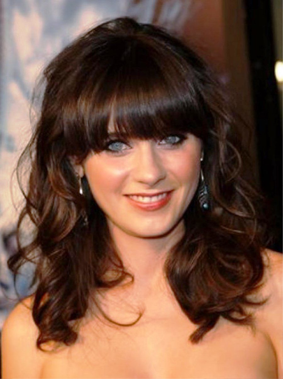 Medium Wavy Hairstyle With Bangs