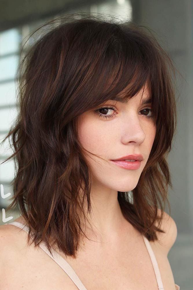 Mid-Length Wavy Cut with Wispy Layers