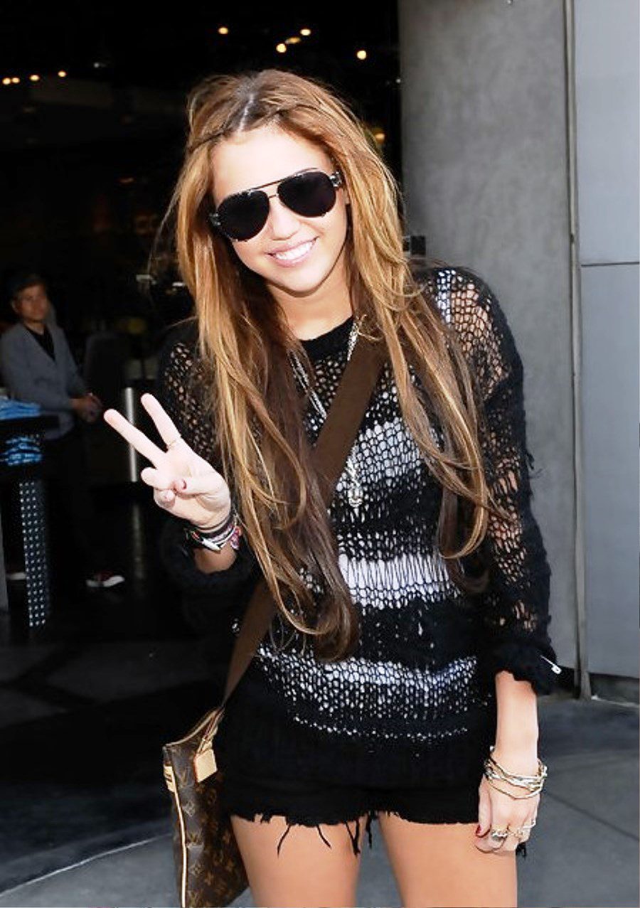 Miley Cyrus Layered Hairstyle With Tiny Braids