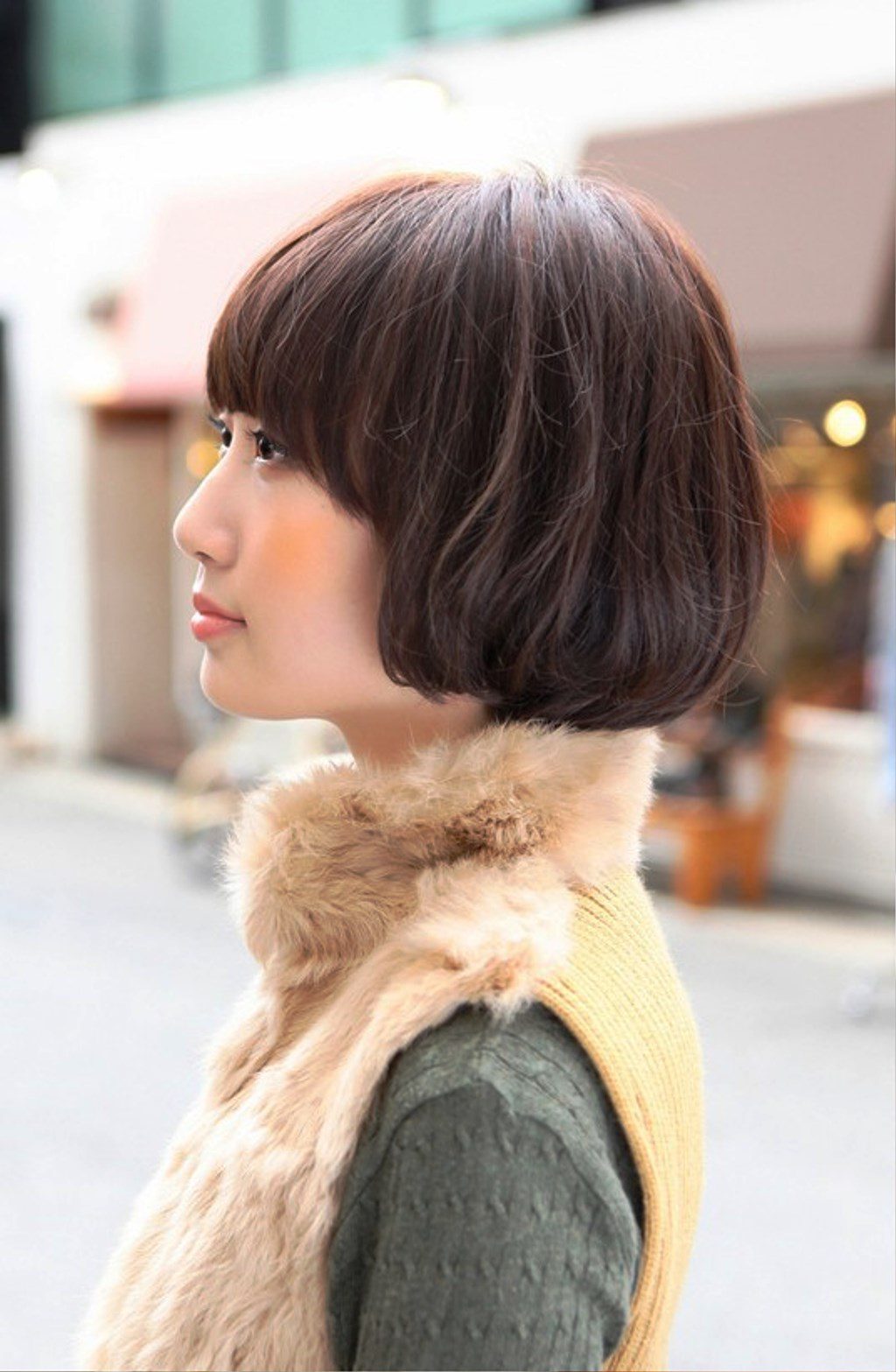 Side View Of Cute Asian Bob Hairstyle