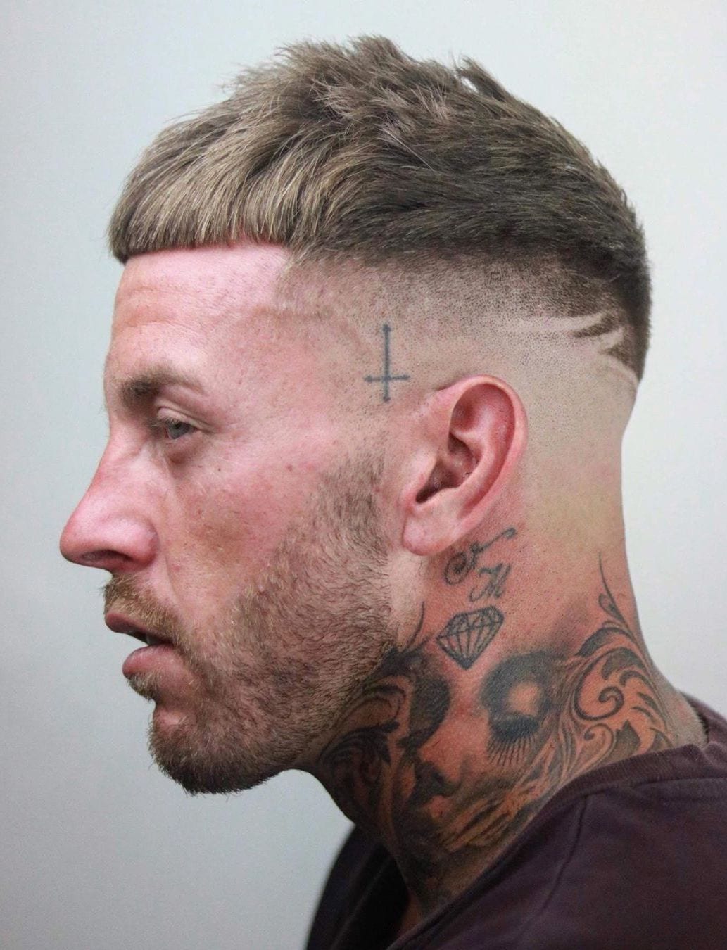 Tattooed Temple with Shaved Side Hairline