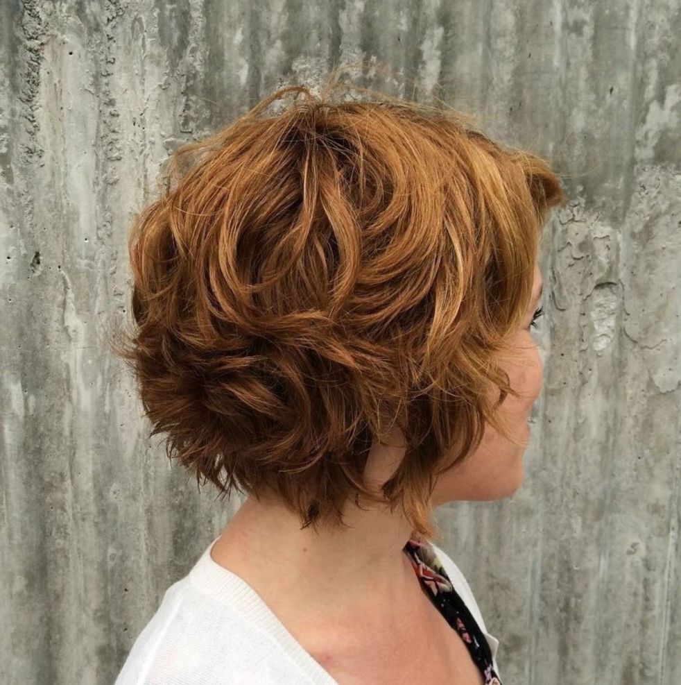 layered short hairstyles for naturally curly hair over 50